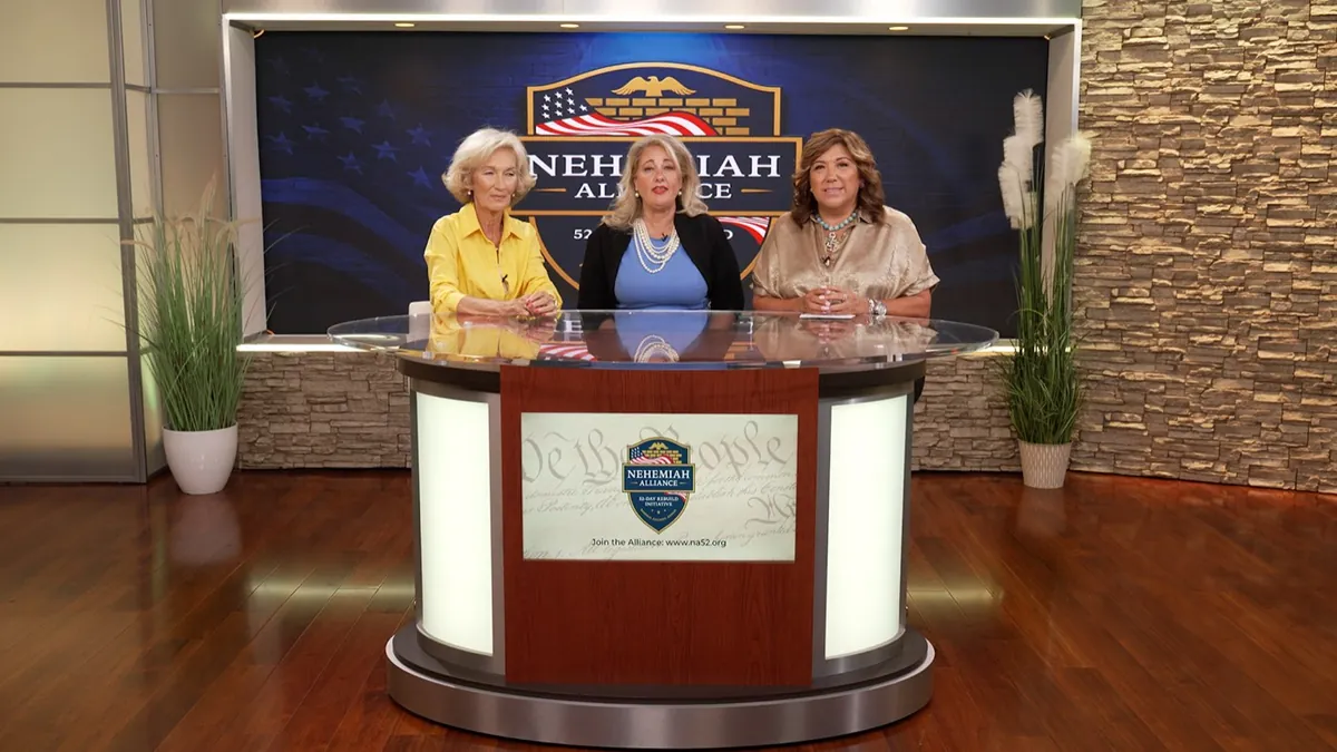 Leadership panel recording an executive communications program on a branded studio set